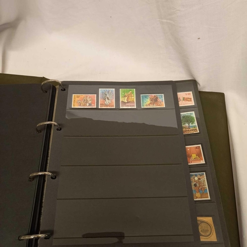 716 - ALBUM OF LOOSE LEAF STAMPS MINT & USED MOSTLY COMMON WEALTH DISPLAYED IN STRIPS - UNMOUNTED