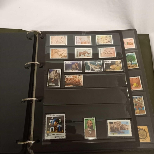 716 - ALBUM OF LOOSE LEAF STAMPS MINT & USED MOSTLY COMMON WEALTH DISPLAYED IN STRIPS - UNMOUNTED