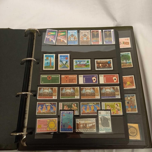 716 - ALBUM OF LOOSE LEAF STAMPS MINT & USED MOSTLY COMMON WEALTH DISPLAYED IN STRIPS - UNMOUNTED