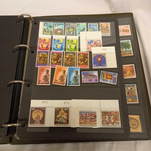 716 - ALBUM OF LOOSE LEAF STAMPS MINT & USED MOSTLY COMMON WEALTH DISPLAYED IN STRIPS - UNMOUNTED