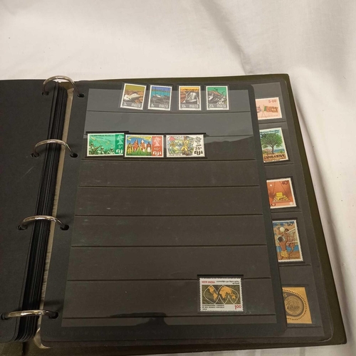 716 - ALBUM OF LOOSE LEAF STAMPS MINT & USED MOSTLY COMMON WEALTH DISPLAYED IN STRIPS - UNMOUNTED