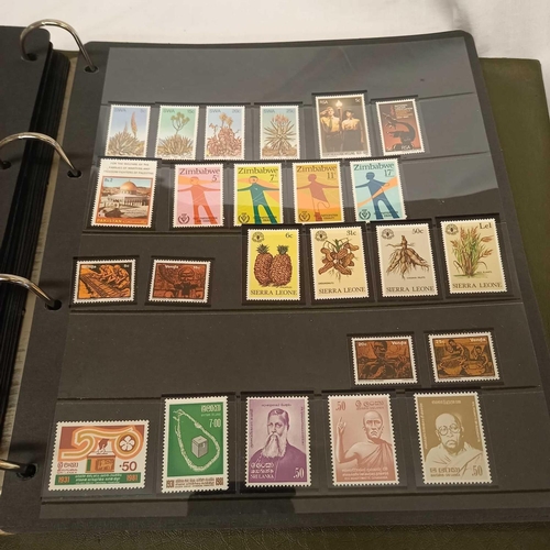 716 - ALBUM OF LOOSE LEAF STAMPS MINT & USED MOSTLY COMMON WEALTH DISPLAYED IN STRIPS - UNMOUNTED