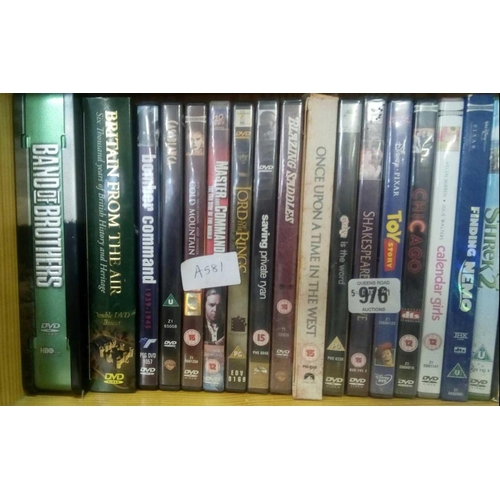 976 - PART SHELF OF DVD'S