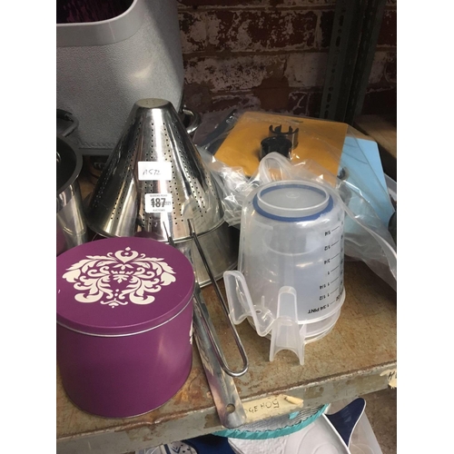 187 - SHELF OF SAUCEPANS, SIEVES, MEASURING JUGS ETC