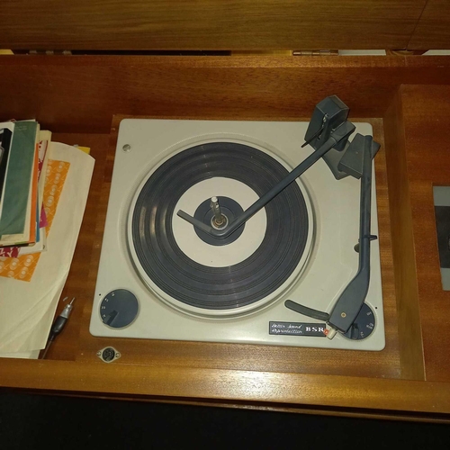 340 - WELSMERE MID CENTURY TEAK RADIOGRAM WITH BSR RECORD DECK & SELECTION OF 45 RPM SINGLES - 44'' LONG