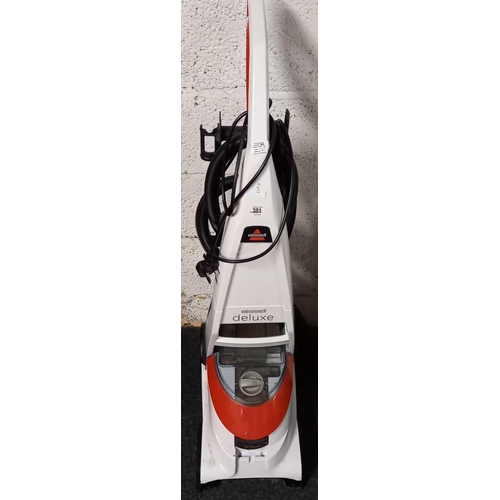 381 - BISSELL DELUX UPRIGHT VACUUM CLEANER WITH ATTACHMENTS