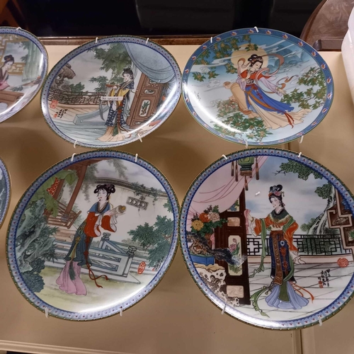 387 - BOX WITH PLATES, 4 NORMAN ROCKWELL, 8 ORIENTAL, 3 LENA LIU FLOWER PLATES