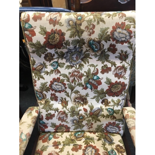 431 - WOOD FRAMED & UPHOLSTERED FIRESIDE ARMCHAIR - WORN