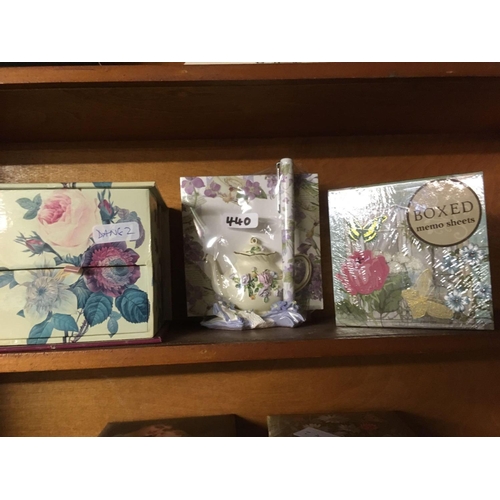 440 - SHELF OF 3 CLOCKS, 2 SHELVES OF BOXED MEMO SHEETS & A SHELF OF ROYAL ALBERT TEA WARE