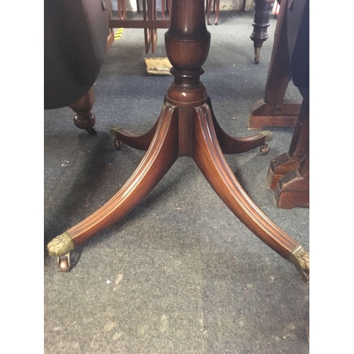 475 - REPRODUCTION MAHOGANY DROP FLAP PEDESTAL DINING TABLE ON BRASS CASTER 3ft WIDE X 2ft EXTENDING TO 5f... 