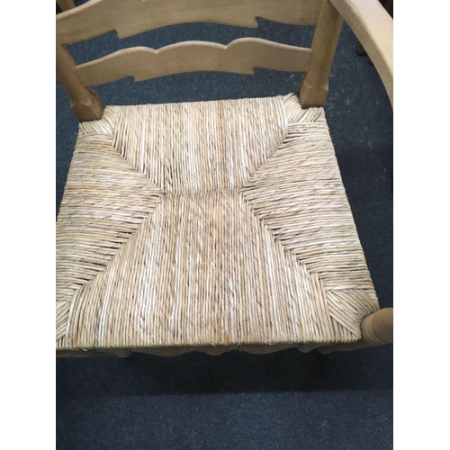 493 - WICKER LADDER BACK CARVER CHAIR WITH MAHOGANY UPHOLSTERED STRIPPED CARVER CHAIR