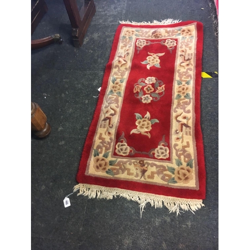 495 - RED & CREAM RUG