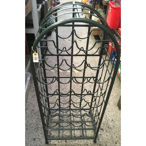 73 - GREEN ROUND TOP METAL WINE RACK FOR 25 BOTTLES