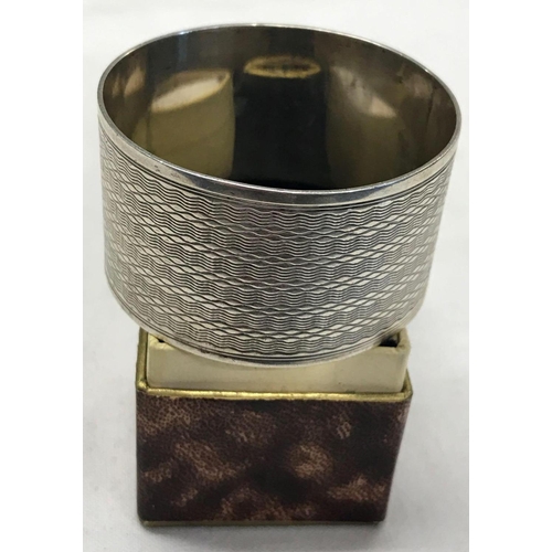 745 - A STERLING SILVER NAPKIN RING IN BOX