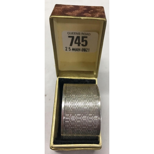 745 - A STERLING SILVER NAPKIN RING IN BOX