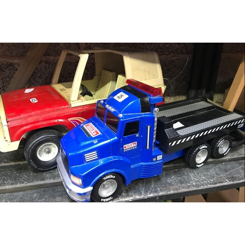 25 - BLUE TONKA PLASTIC TOWING TRUCK & A RED & CREAM METAL TONKA JEEP