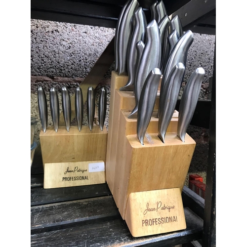 13 - SHELF WITH QTY OF STAINLESS STEEL CUTLERY, GLASS BOWLS, COFFEE CUPS & 2 JEAN PATRIGUE PROFESSIONAL K... 