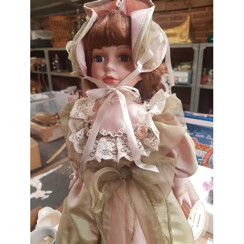 53 - SHELF OF MISC PORCELAIN DOLLS ON STANDS & 1 OTHER PLASTIC IN BOX