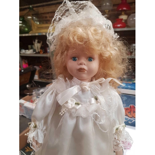 53 - SHELF OF MISC PORCELAIN DOLLS ON STANDS & 1 OTHER PLASTIC IN BOX