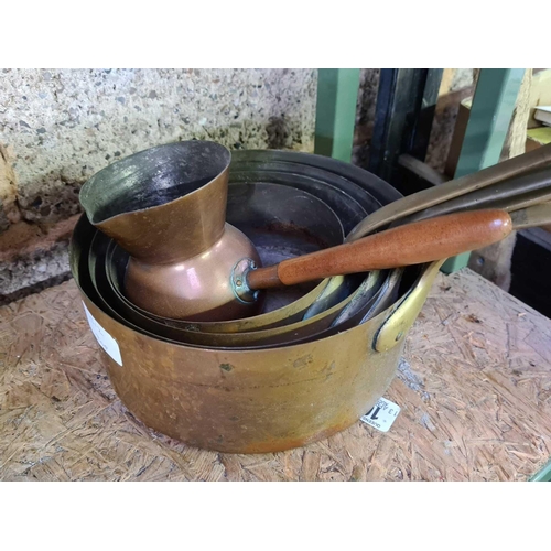 10 - GRADUATED SET OF BRASS HANDLED COPPER SAUCEPANS & 1 COPPER BRANDY WARMER