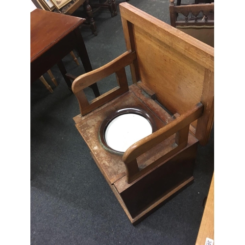 347 - A MAHOGANY CASED COMMODE