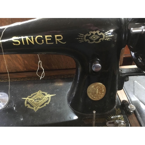 352 - OAK CASED SINGER SEWING MACHINE