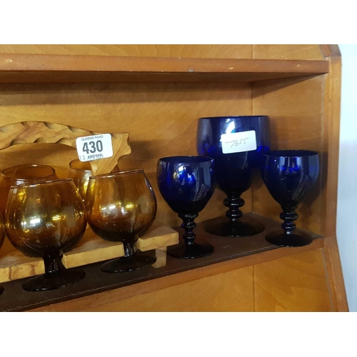 430 - BLUE & ORANGE GLASSES ON WOODEN STAND