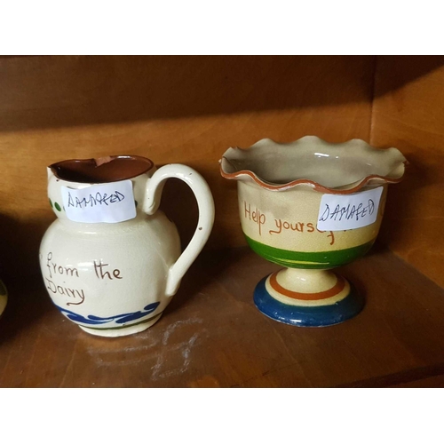 431 - 2 SHELVES OF MOTTO / TORQUAY WARE, SOME PIECES DAMAGED