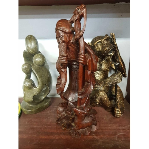 452 - FIGURE OF A MONKEY, AN ETHNIC CARVING & A HARD STONE FIGURE