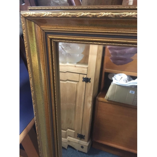 584 - LARGE RECTANGULAR GILT  BEVELLED EDGE MIRROR