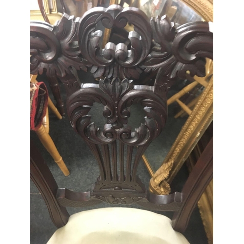 607 - MAHOGANY NURSING CHAIR & MAHOGANY CARVED DINING CHAIR