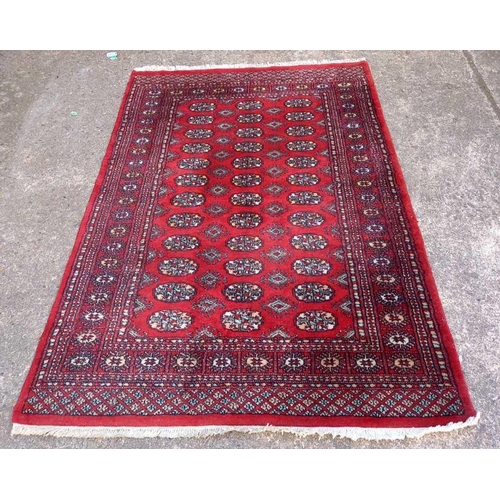 618 - 2 RED PATTERNED RUGS, 4ft 7'' & 7ft 11'' X 4ft 10''