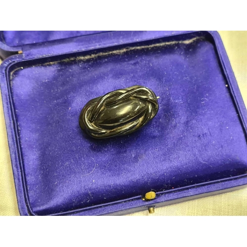 701 - A MOURNING BROOCH IN BLUE SILK COVERED BOX