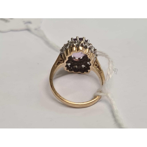 758 - A 9ct OVAL CLUSTER RING