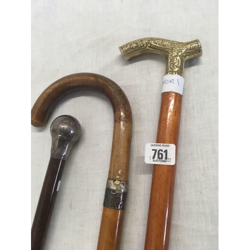 761 - THREE WALKING CANES, ONE WITH SILVER COLLAR MARKED WITH THE NAME F. M DAVIDSON, A SECOND WITH SILVER... 