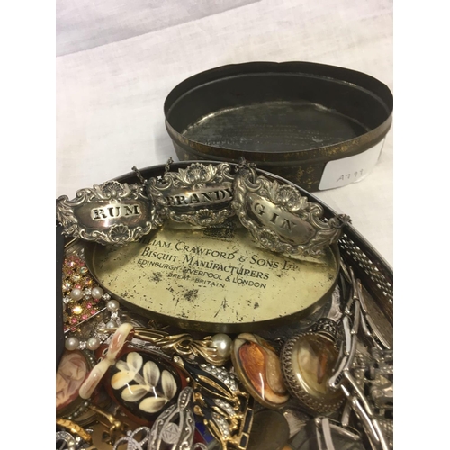 790 - TIN OF COSTUME JEWELLERY