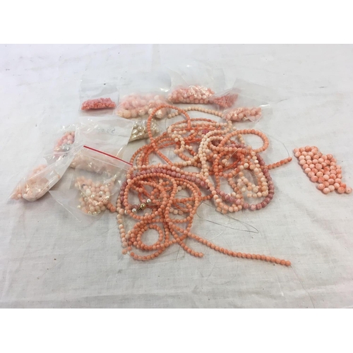 807 - SMALL CARDBOARD BOX OF CORAL BEADS, NECKLACES ETC