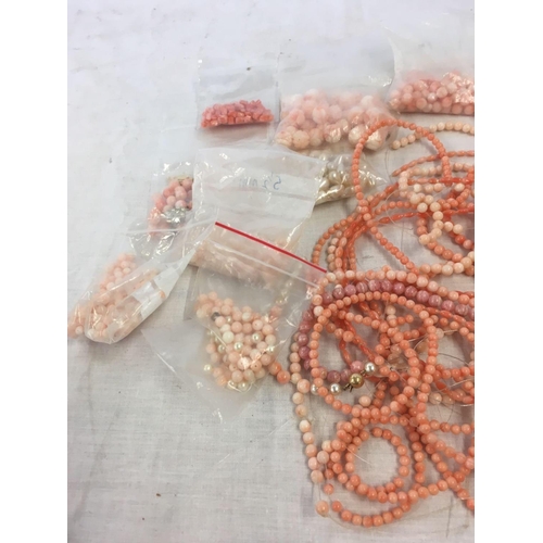 807 - SMALL CARDBOARD BOX OF CORAL BEADS, NECKLACES ETC