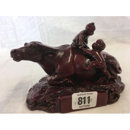 811 - 2 RED HARD STONE CARVINGS, ONE IF WATER BUFFALO WITH CHILDREN, THE SECOND  WITH SAGE