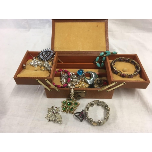 822 - BOX OF BADGES, CANTILEVER JEWELLERY BOX & CONTENTS, YELLOW BEAD NECKLACE ETC