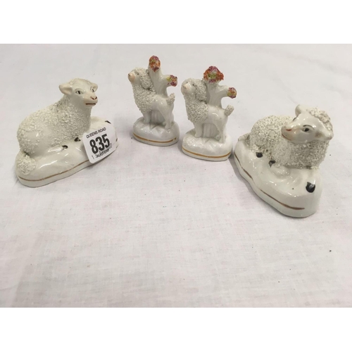 835 - 5 STAFFORDSHIRE POTTERY FIGURES,  4 MODELLED AS SHEEP & LAMBS, 5TH AS A SHOE