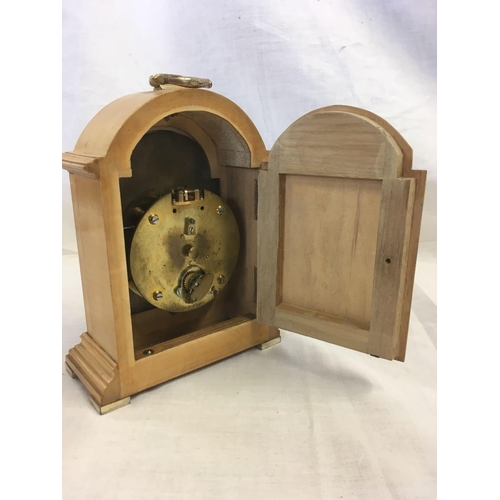 838 - SMALL WOODEN CARVED MANTEL CLOCK