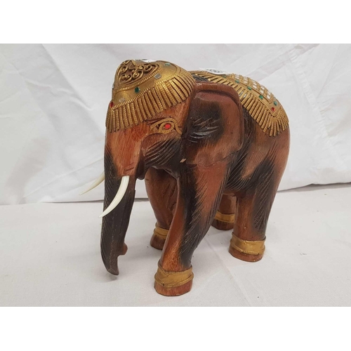 858 - CARVED WOODEN MODEL OF AN INDIAN ELEPHANT