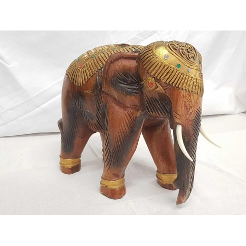 858 - CARVED WOODEN MODEL OF AN INDIAN ELEPHANT