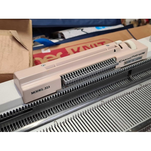 98 - KNITMASTER KNITTING MACHINE & A CARTON WITH SPARE PARTS