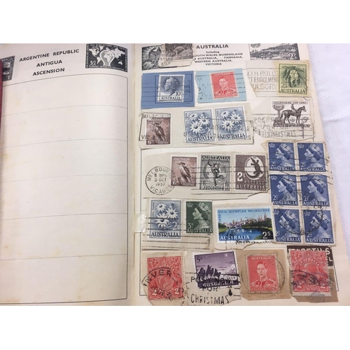 928 - TUB OF MISC USED POSTAGE STAMPS & POSTCARDS