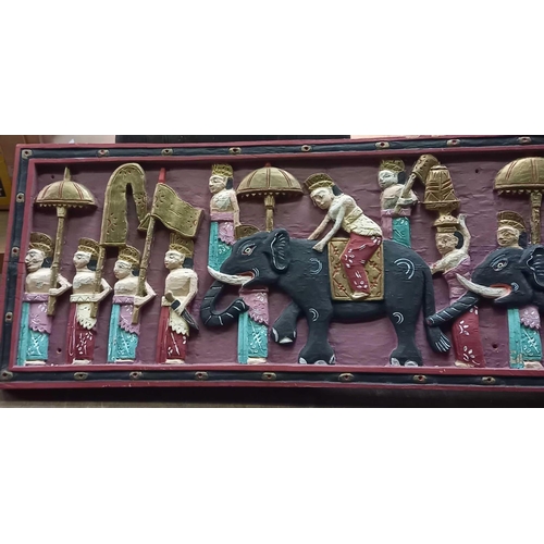 124 - LARGE CARVED PAINTED WOOD PLAQUE OF ORIENTAL DESIGN WITH FIGURES & ELEPHANTS, 5ft LONG