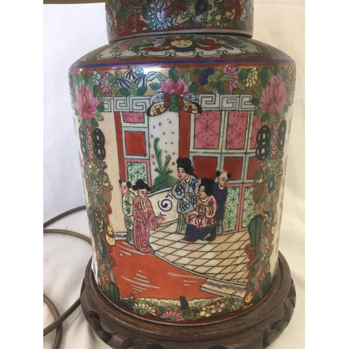 335 - HAND PAINTED HEAVILY DECORATED CHINESE TABLE LAMP ON WOODEN BASE IN THE FORM OF A GINGER JAR WITH SH... 