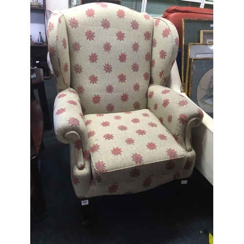 363 - UPHOLSTERED HIGH BACK WING ARMCHAIR