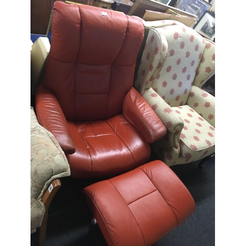 367 - TERRACOTTA COLOURED HIGH BACK EKONES REVOLVING ARMCHAIR WITH MATCHING FOOT REST